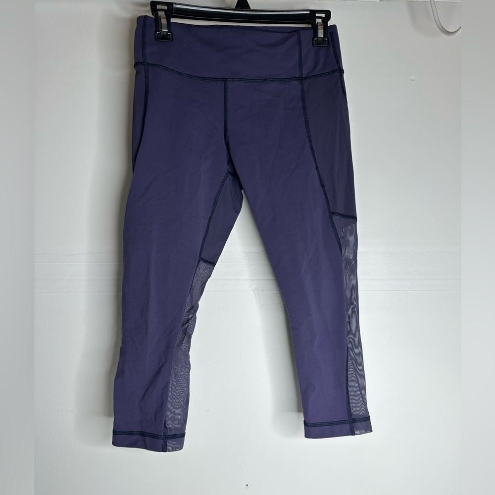 Lululemon Capri Pants Purple Mesh Sides Size 6.
